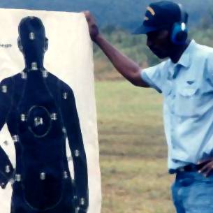 Tommy Cook (USN Ret.) conducting U.S. Navy Marksmanship Training (Hawaii)